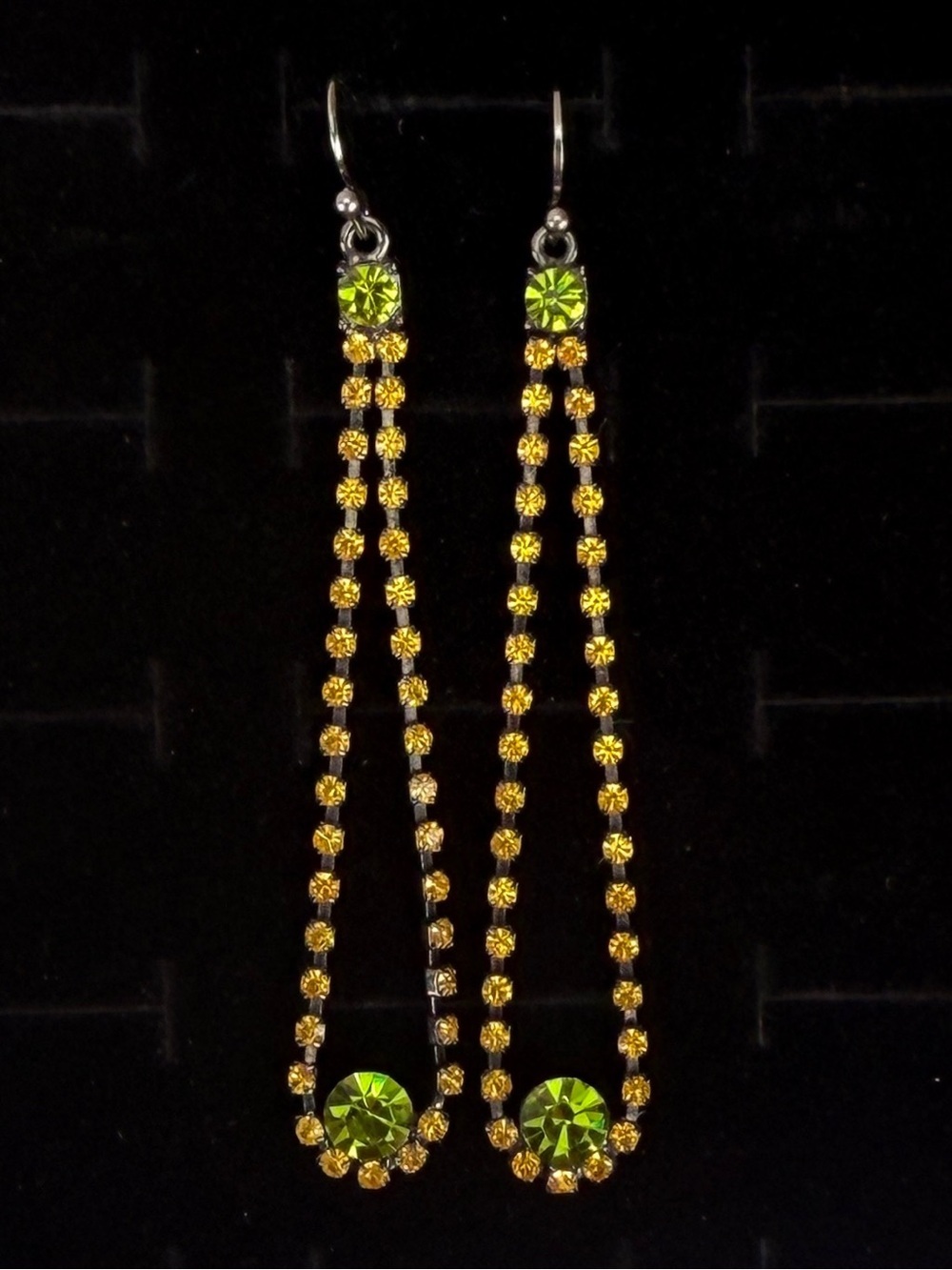 Beautiful black gunmetal Amber tone and green reflective pierced earrings